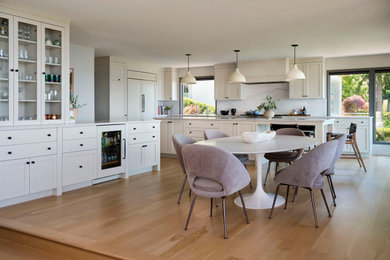 Example of a transitional dining room design in Seattle