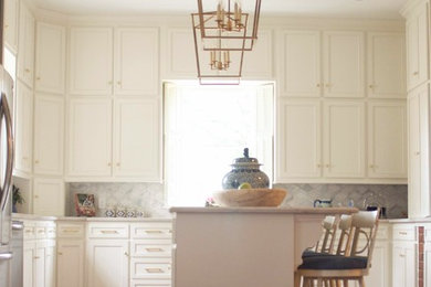 Transitional terra-cotta tile and red floor eat-in kitchen photo in Little Rock with white cabinets, gray backsplash and an island
