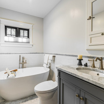 Vintage Inspired Traditional Bathroom with Freestanding Soaking Tub