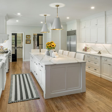 Extra-long eat-in island in a white kitchen