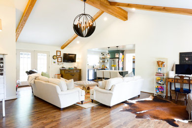 Example of a large cottage chic formal and open concept dark wood floor and brown floor living room design in Atlanta with gray walls and no tv