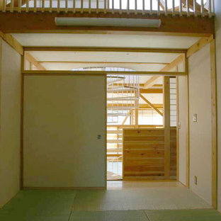 Photo of a modern craft room in Other with white walls, tatami flooring, no fireplace and beige floors.