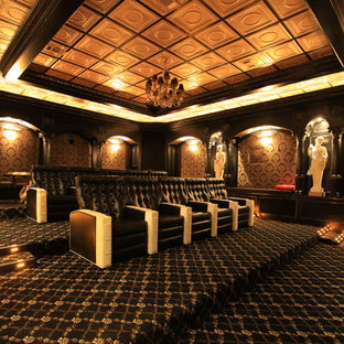 Inspiration for a huge victorian enclosed carpeted and multicolored floor home theater remodel in Other with multicolored walls and a wall-mounted tv