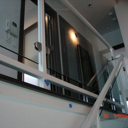 Steel stairs with glass panel - Products