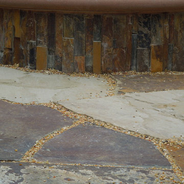 Unused sideyard turns into fantastic firepit area with water feature