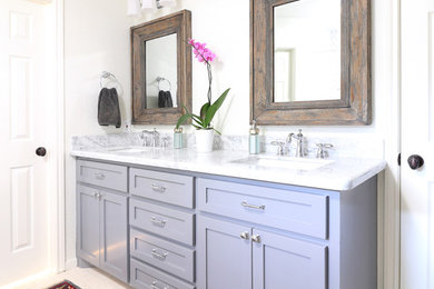 Example of a mid-sized classic master white tile and subway tile limestone floor and white floor bathroom design in Houston with shaker cabinets, gray cabinets, white walls, an undermount sink and marble countertops