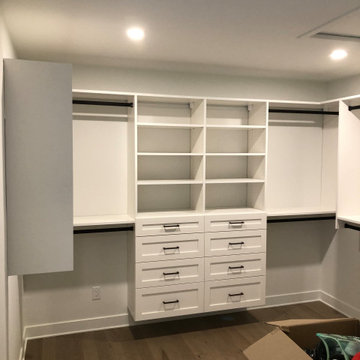 Wall Mounted Walk In Closet With Shaker Style Drawer Faces