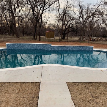 Custom Concrete Pool With Elevated Back Wall