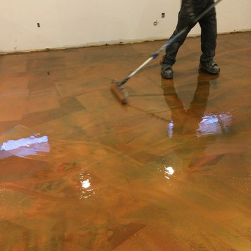 Epoxy metallic pigment on concrete floor in basement
