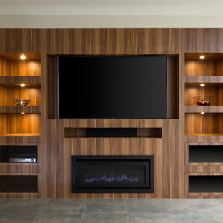 This is an example of a medium sized modern home cinema in Melbourne with brown walls, marble flooring and a built-in media unit.