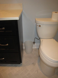 The toilet paper holder mounted inside the cabinet door under the sink. -  Picture of Mana Kai Maui - Tripadvisor