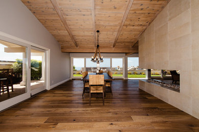 Example of a beach style dining room design in Orange County