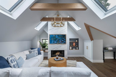 Photo of a traditional living room in Boston with exposed beams.