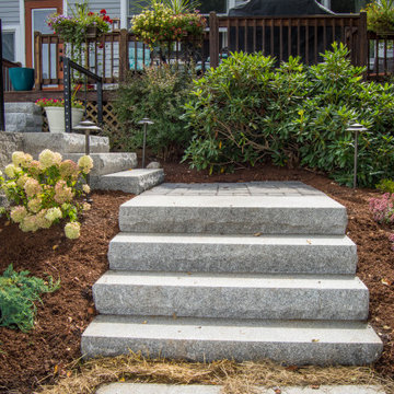 Outdoor Kitchen, Firepit, Patio, Stairs, Retaining Wall and Flowerbeds