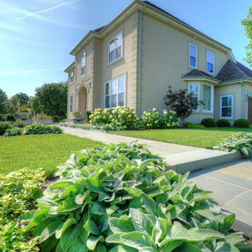 Hawthorn Woods Colonial - Entry Courtyard and Fireplace Terrace