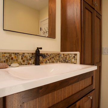 Sink with Small Glass Tile Backsplash and Additional Storage