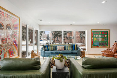 Mid-century modern living room photo in Denver