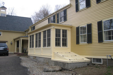 Example of a classic exterior home design in Boston