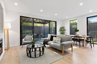 Inspiration for a large modern living room in Melbourne.