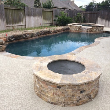 Houston Outdoor Kitchen With Traeger Grill and Scabos Split Face Stone