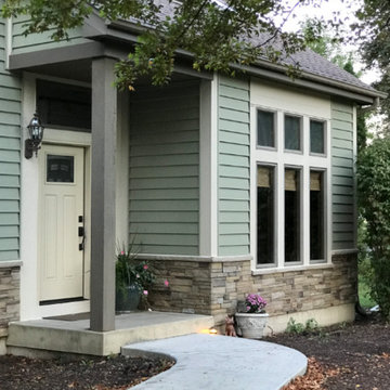 Oswego Home Receives Stone Wainscoting and New Siding