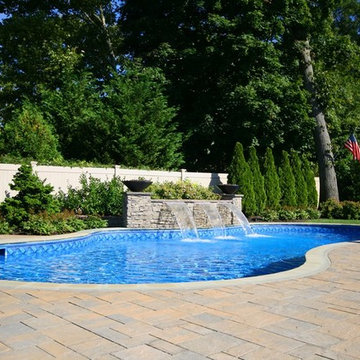 Custom swimming pool with water feature