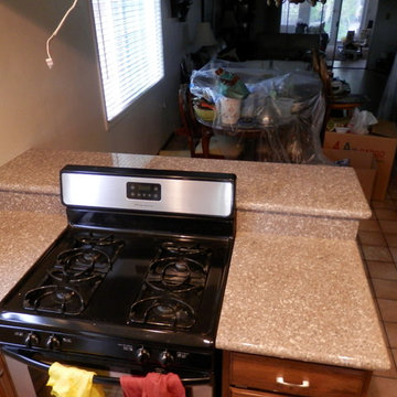 Kitchen Cabinets and Refinish with New Counter top