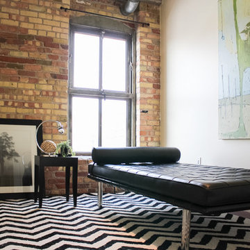 Downtown Industrial Condo Bonus Room with Exposed Brick Walls