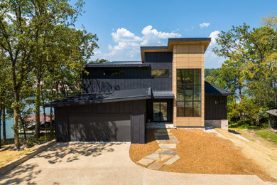 Example of a minimalist exterior home design in Little Rock