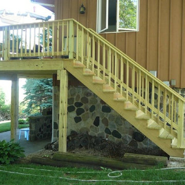 Second Story Deck with Stairs to Backyard