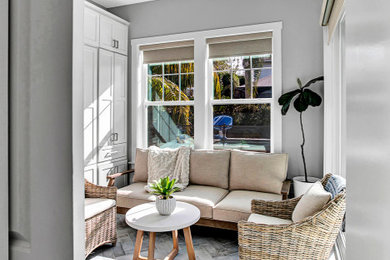 Example of a small beach style ceramic tile sunroom design in Jacksonville