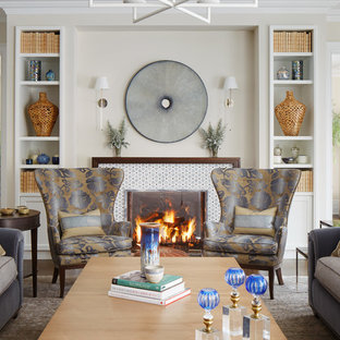 Example of a large classic formal and enclosed dark wood floor living room design in Chicago with beige walls, a standard fireplace, a tile fireplace and no tv