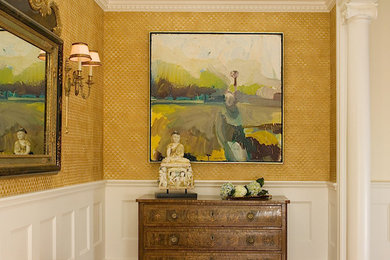 Large elegant medium tone wood floor and brown floor entry hall photo in San Francisco with beige walls