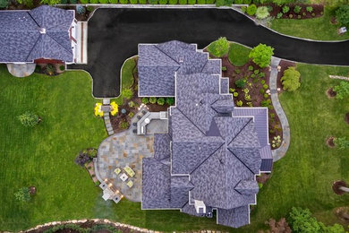 Example of a large mountain style home design design in New York