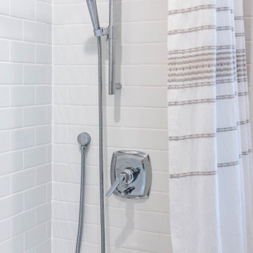 Classic and Fresh Bathroom with an exciting Navy Tile Wall