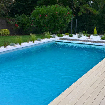 Construction d’une piscine avec belle terrasse en bois