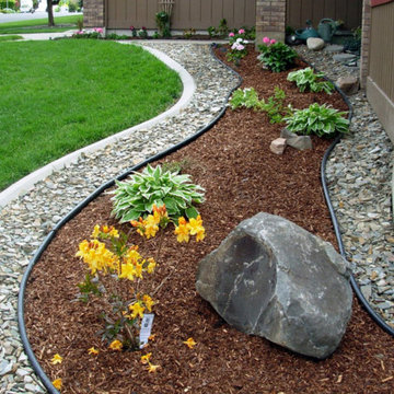 Rebuilding and mulching flower bed