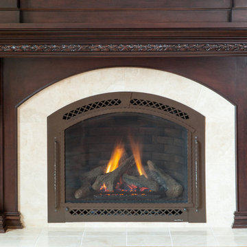 Dark Stained Cherry Cabinetry Surrounds Flush Hearth Stone Tile Fireplace