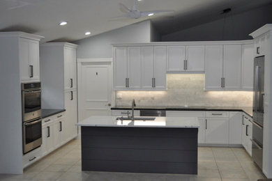 Example of a transitional kitchen design in Miami