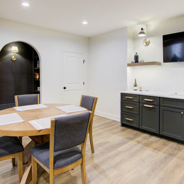Warm & Inviting Basement Retreat with Kitchenette and Reading Nook