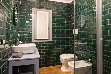 Transitional 3/4 bathroom in Venice with a corner shower, a two-piece toilet, green tile, subway tile, medium hardwood floors, a vessel sink and wood benchtops.