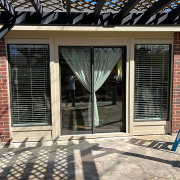Primed James Hardie Siding in Universal Khaki.
