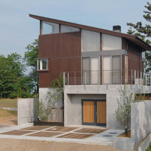 他の地域のモダンスタイルのおしゃれな家の外観 (マルチカラーの外壁、片流れ屋根) の写真