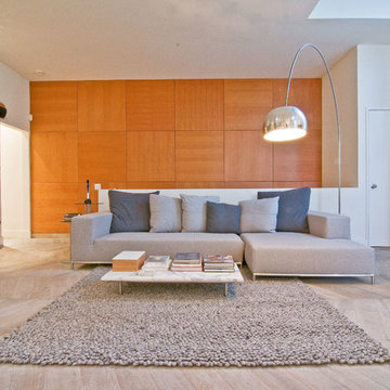 Living Area Features Chevron Hardwood Flooring
