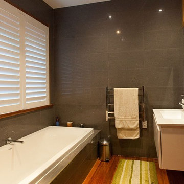Floor to ceiling tiles add luxury and lustre
