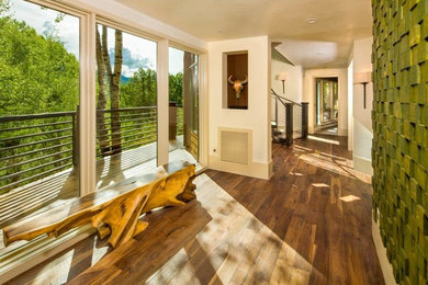 Inspiration for a rustic entryway remodel in Denver