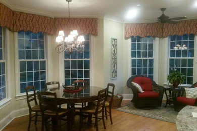 Example of a large transitional home design design in Charleston