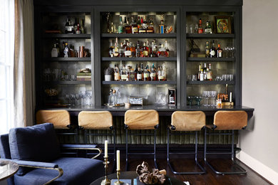 Example of a small trendy single-wall dark wood floor seated home bar design in Nashville with open cabinets, gray cabinets, quartz countertops, gray backsplash, gray countertops and metal backsplash