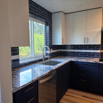 Blue and White Kitchen with Tiled Pass Through