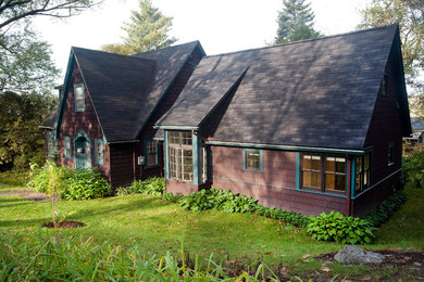 Inspiration for a timeless brown wood exterior home remodel in Burlington